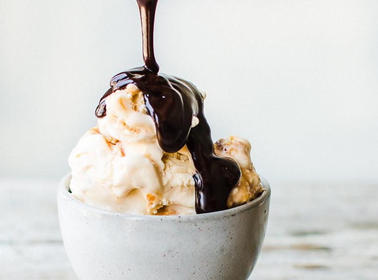 herco-range-toppings-and-dessert-sauces-hero.jpg Banner showing topping on ice cream from Hero's range of dessert sauces